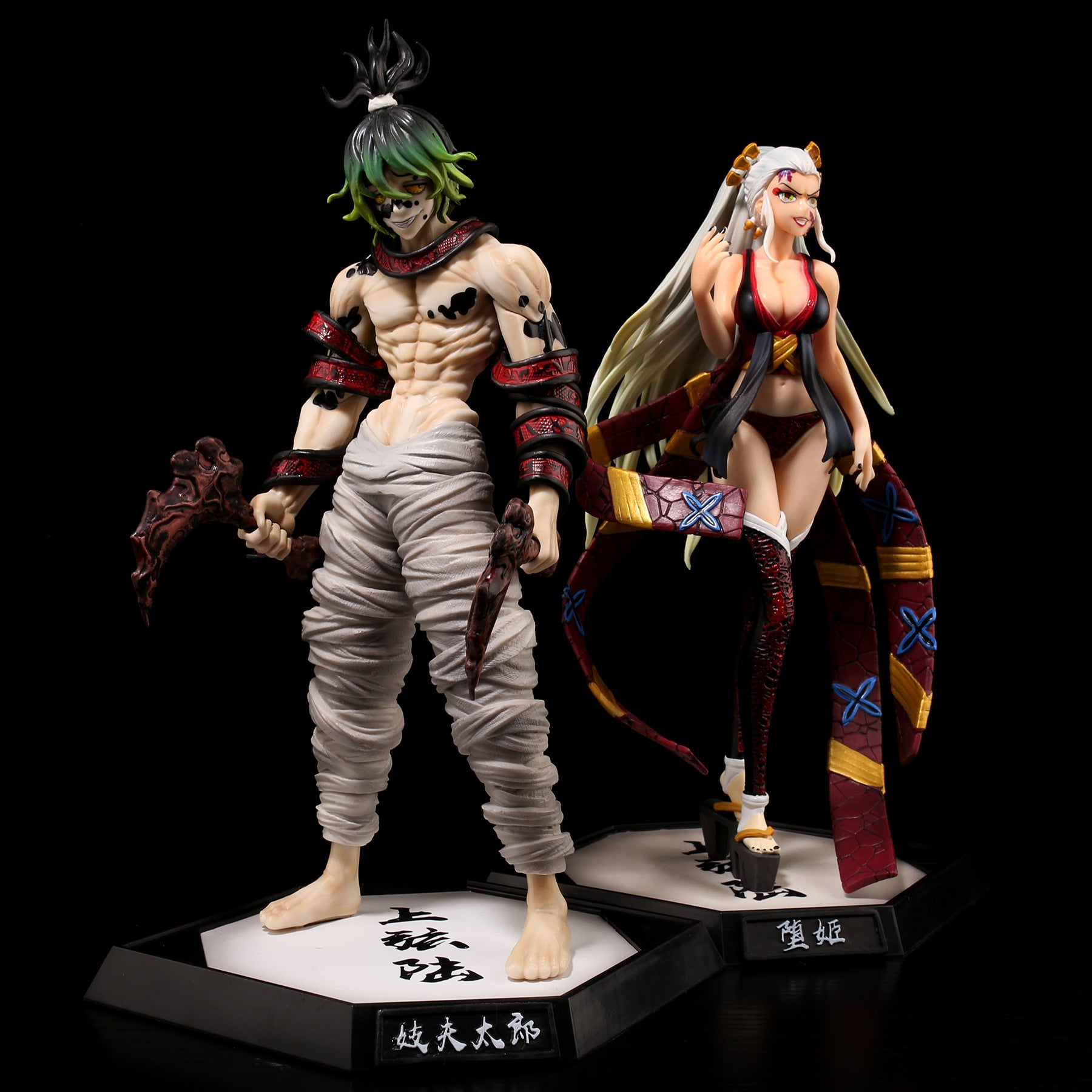 The Gyutaro Demon Slayer Figure is a 29CM PVC action figure from Kimetsu no Yaiba, featuring Gyutaro with green hair, white pants, and a spiked weapon on a hexagonal base. Next to him is a female figure with long light hair and patterned accessories, ideal for anime collectors!.