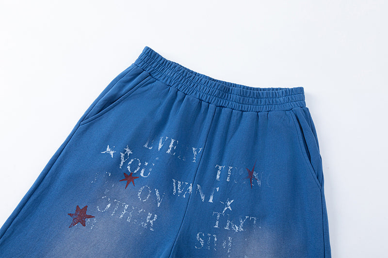 Pantalon de survêtement à jambes larges avec motif d’étoiles et de lettres, coupe décontractée délavée