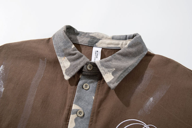 Chemise à manches courtes et col polo – Polo graffiti patchwork camouflage avec pinceau