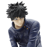 The Jujutsu Kaisen Megumi Fushiguro & Tsumiki PVC Figure features a 17 cm statue of an anime character with spiky black hair, wearing a dark blue high-collared jacket, slightly leaning forward with a subtle smile and sideward gaze, reminiscent of Megumi from Jujutsu Kaisen.