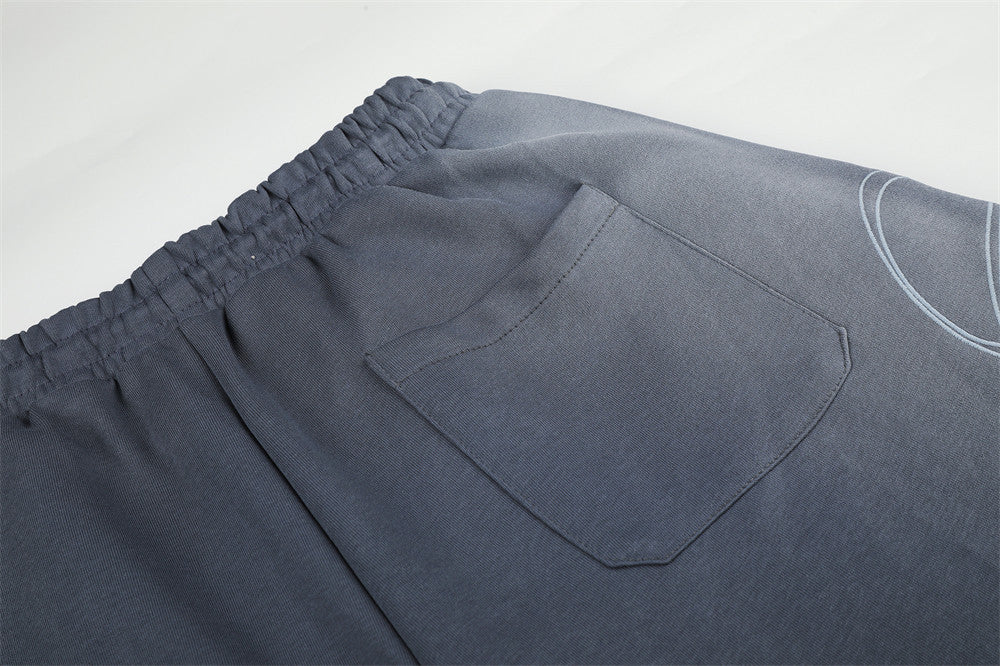 Wide-Leg Sweatpants with Cursive Script Print and Drawstring Hem
