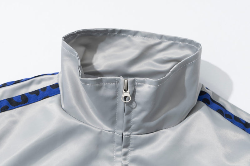 Blouson bomber satiné brodé à col montant et bandes léopard