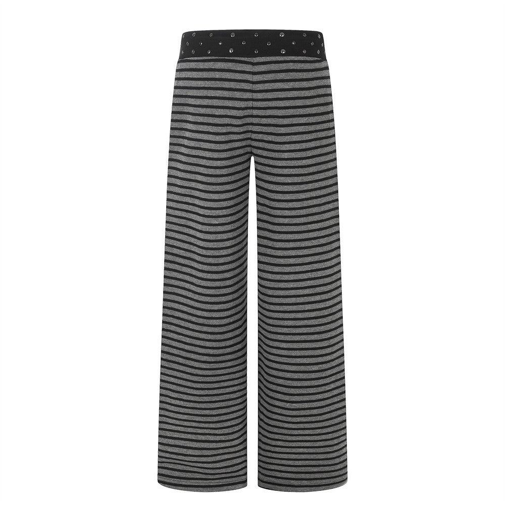 Black and gray striped wide-leg pants with studded waistband, back view