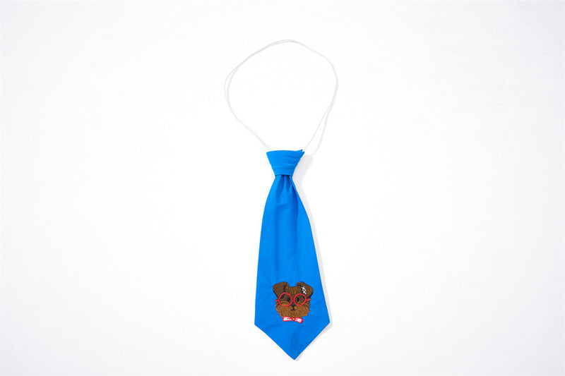 Blue tie with cartoon dog face embroidery on a white cord