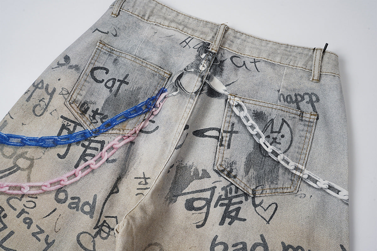 Wide-Leg-Jeans mit Graffiti-Print, Schlüsselanhänger-Anhängern und Deko-Ketten