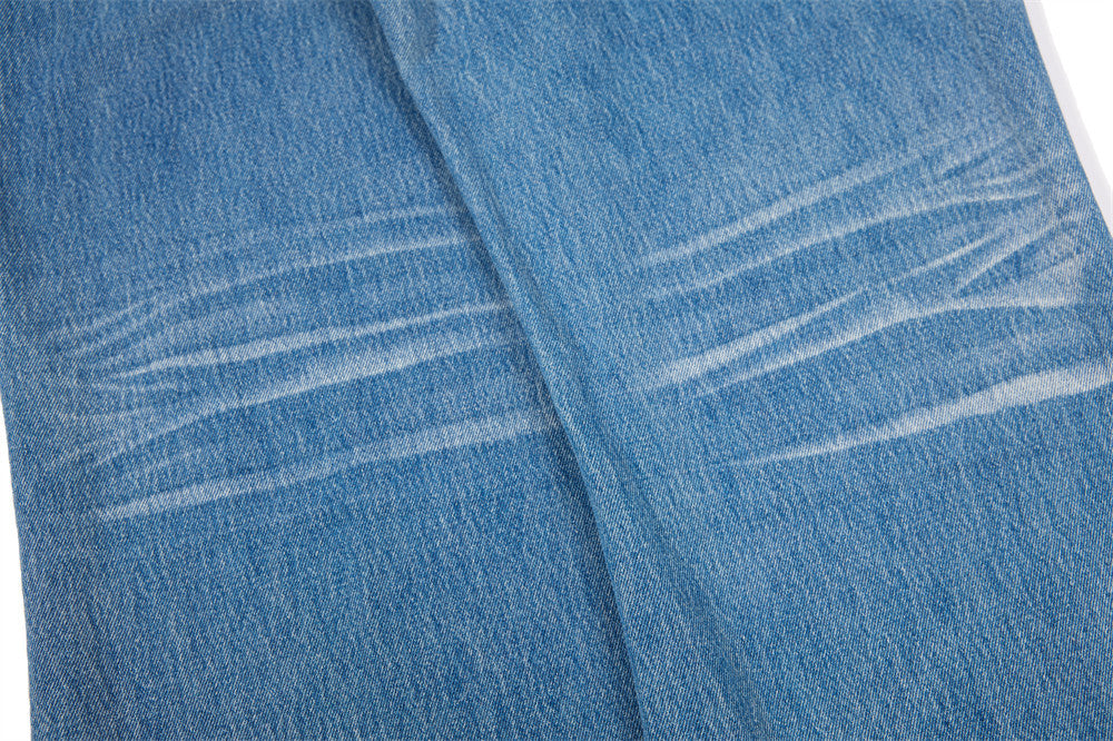 Distressed Flare Jeans – Men's Washed Blue Wide-Leg Denim with Paint Splatter