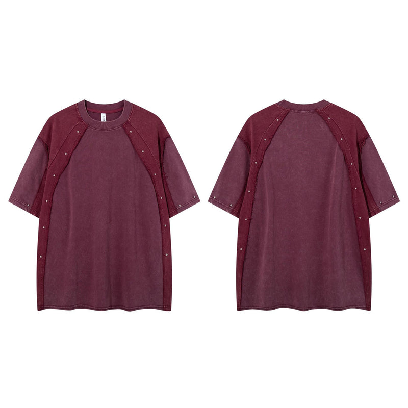 T-shirt patchwork raglan délavé à l’acide, coutures à bords bruts et détails rivetés