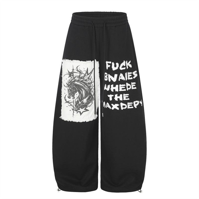 Pantalon de survêtement homme à jambes larges, motif graphique – Écusson licorne et slogan imprimé noir