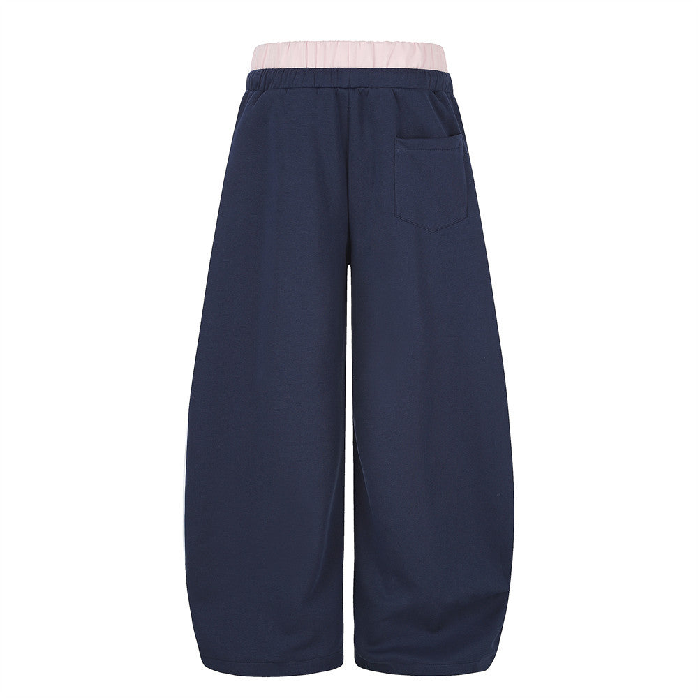 Navy wide-leg sweatpants, back view with pink double waistband and back pocket
