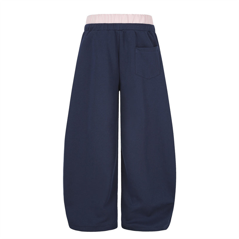 Navy wide-leg sweatpants, back view with pink double waistband and back pocket