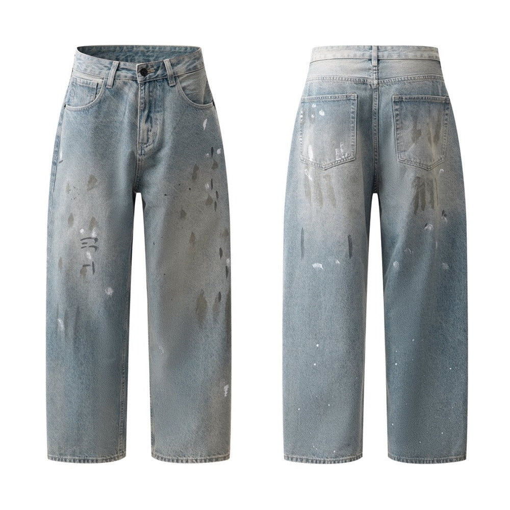 Men's wide-leg vintage washed baggy jeans with paint splatter and distressed detailing, front and back view