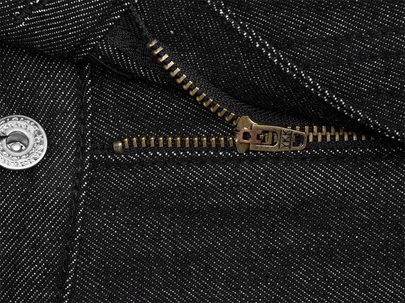Jean homme à jambes larges avec broderie de badge et empiècements patchwork déconstruits