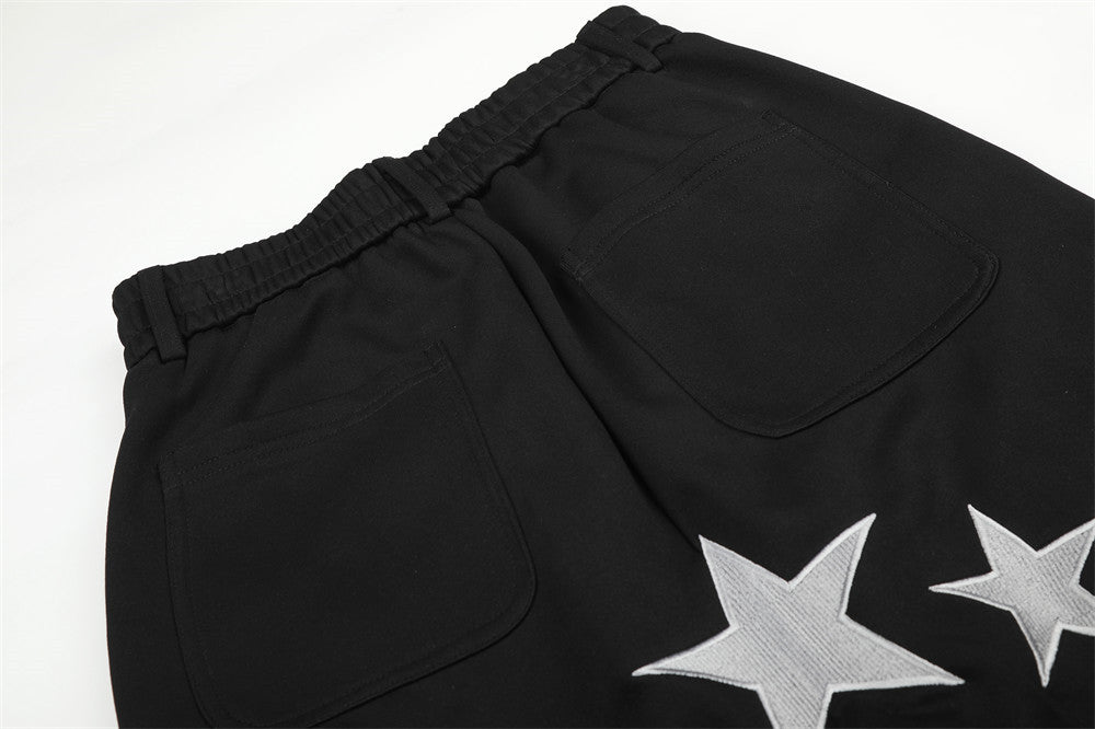 Pantalon de survêtement à jambes larges avec broderie Pégase, imprimé Union Jack et écussons étoile