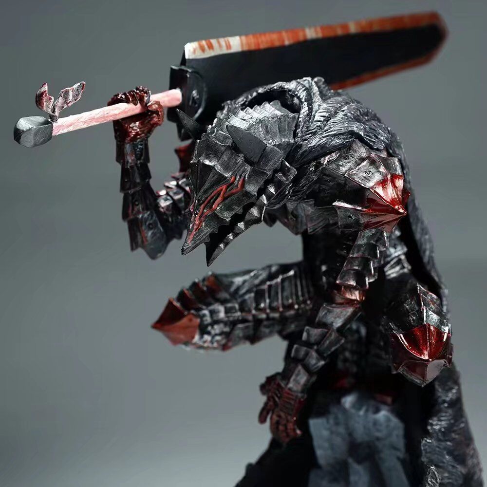 The Berserk Legend of the Golden Warrior – Guts L Version PVC anime figure features heavily armored and battle-damaged details with dark, jagged armor and red accents, displaying him holding a large sword over his shoulder in a slightly hunched pose against a gray background.