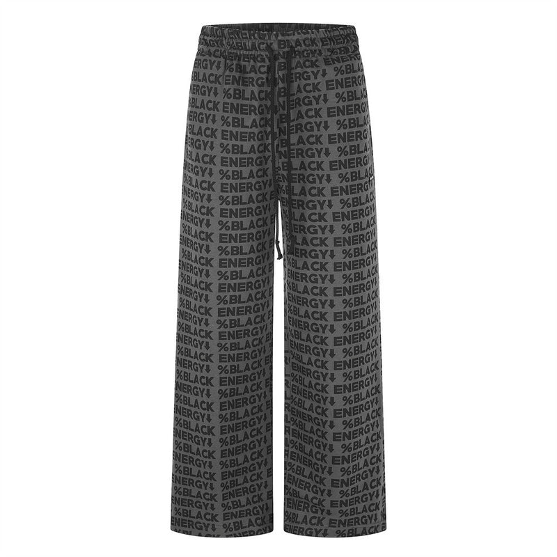Black wide-leg sweatpants with allover BLACK ENERGY print, front view