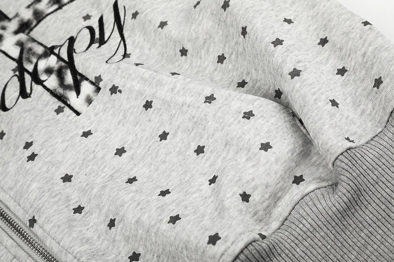 Sweat à capuche zippé court à motif étoiles et croix