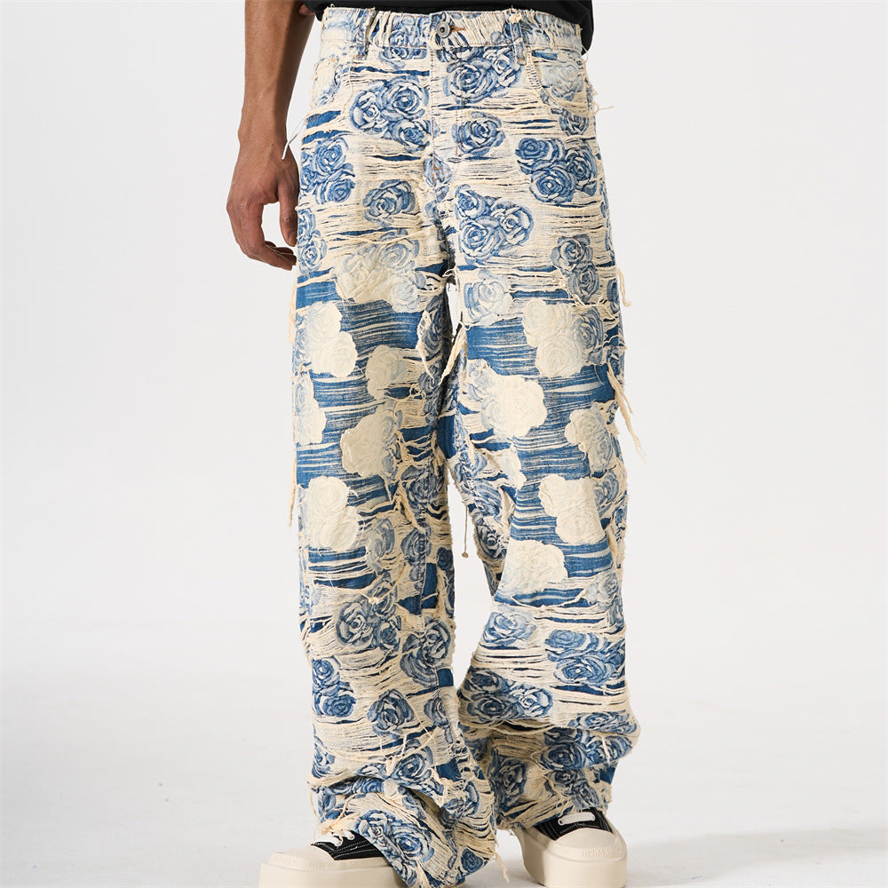Men's wide-leg blue rose jacquard distressed jeans with fringe detailing, front and back view