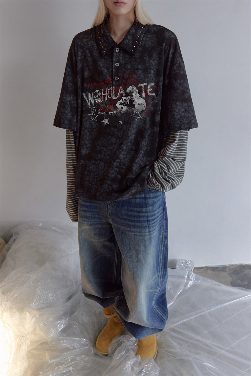 Model wearing a dark mottled polo shirt with striped long sleeves, collared neckline, and front graphic