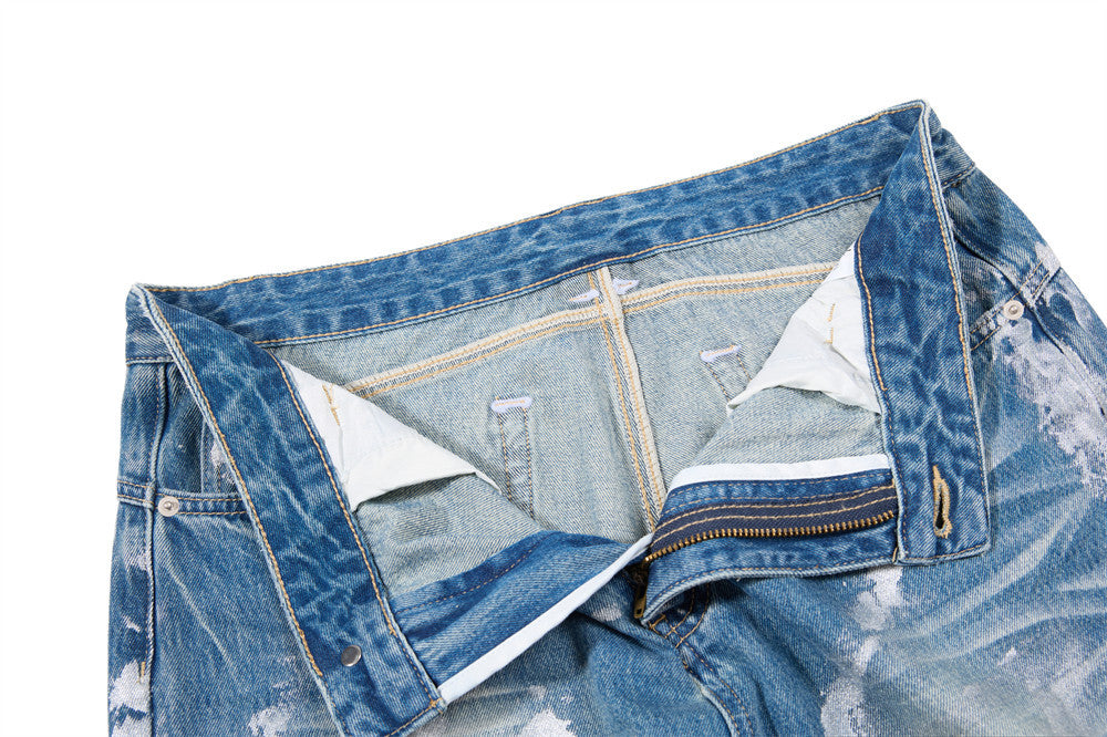 Distressed Flare Jeans – Men's Washed Blue Wide-Leg Denim with Paint Splatter