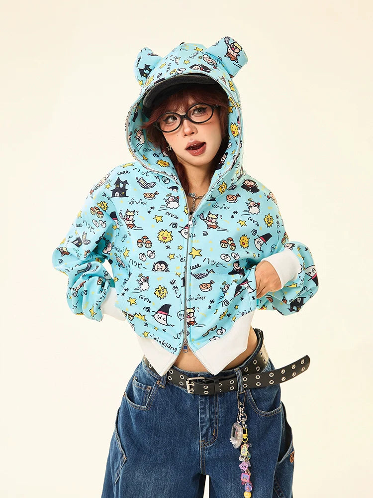 Wearing Seakoff's Kawaii Cartoon Bear Hoodie, a full-zip with fun cartoon print and adorable ears, they effortlessly complement their jeans and studded belt. With hands in the pockets, glasses on their nose, and a cap added, they're rocking a whimsical streetwear vibe.