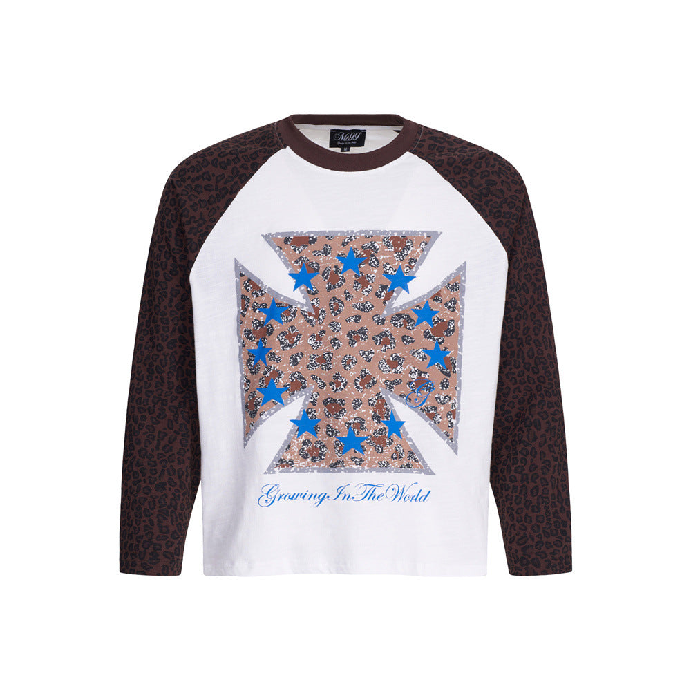 Men's white long-sleeve raglan t-shirt with dark brown leopard-print sleeves and iron cross graphic with blue stars on chest