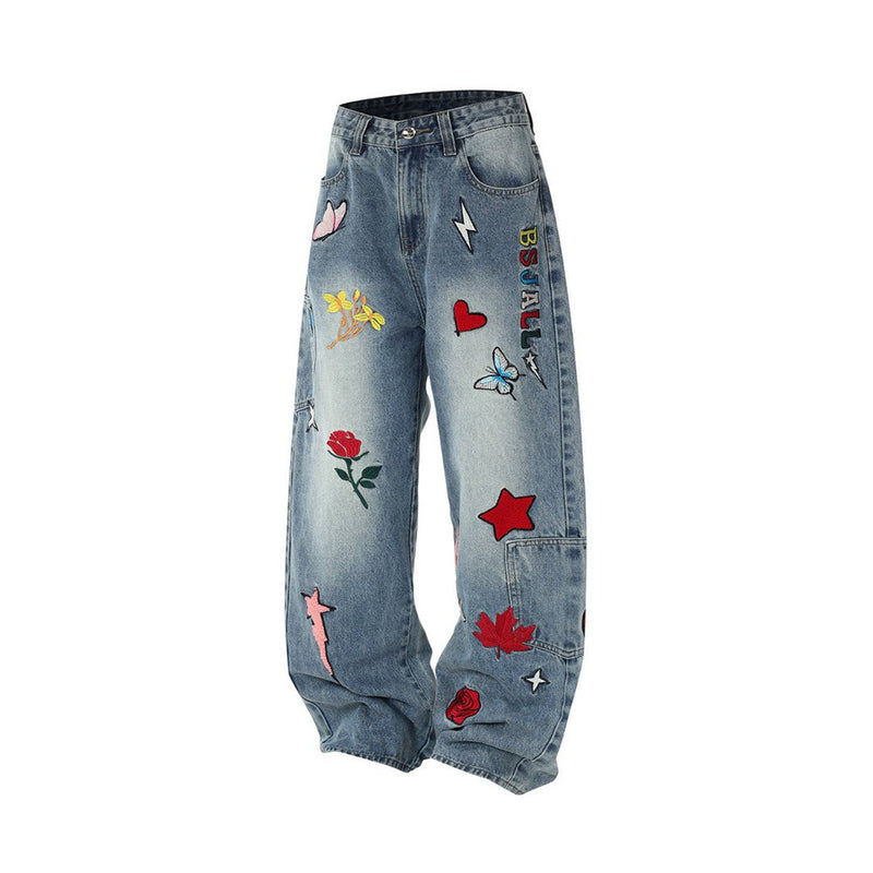 Vaqueros baggy de pierna ancha con flores bordadas, mariposas y motivos de patchwork
