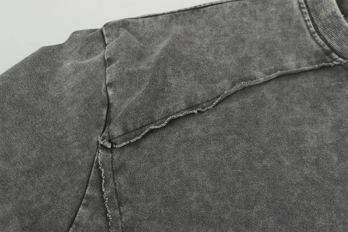 Pull homme gris à col rond – Délavé à l’acide, déstructuré, manches longues à bords bruts