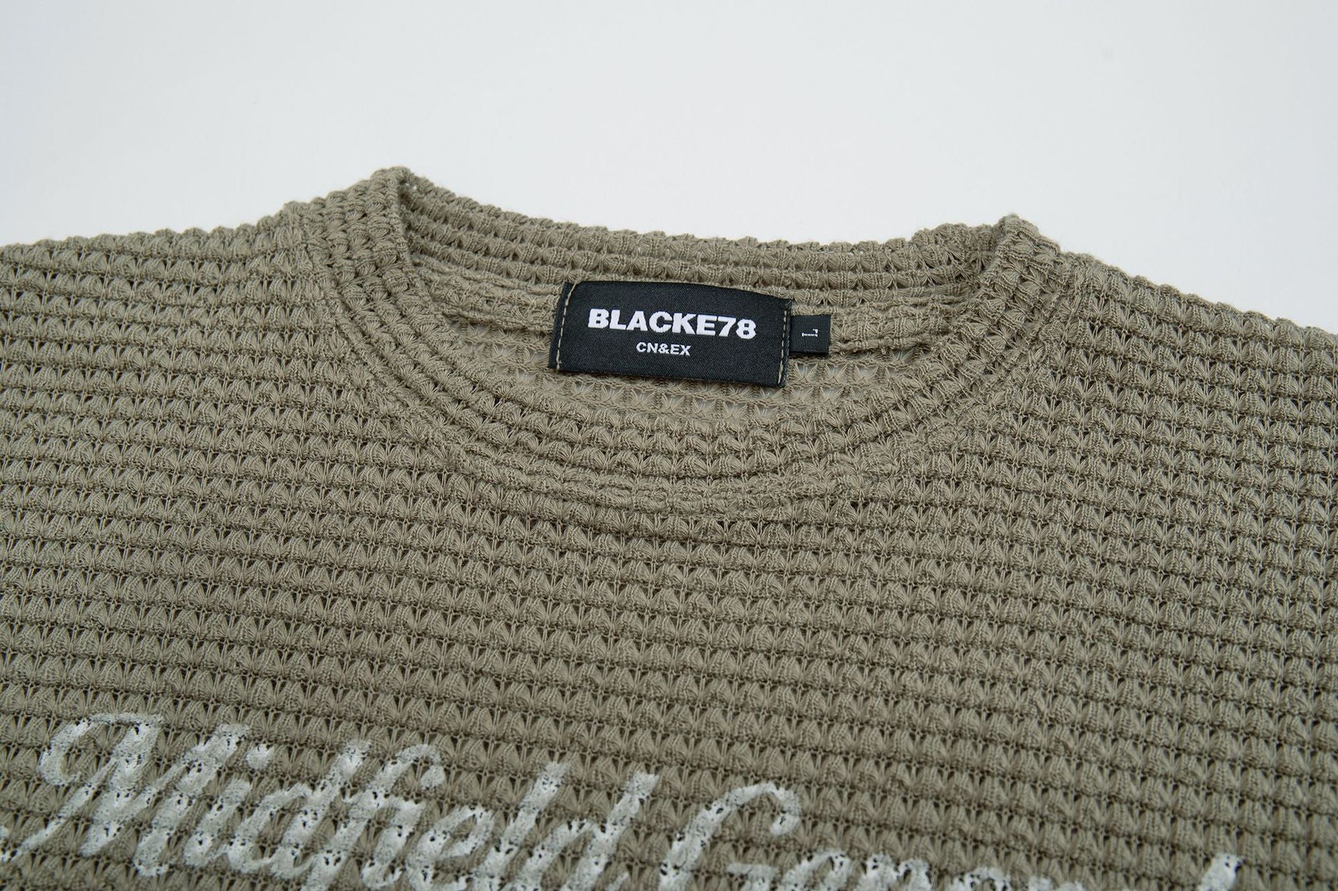 Midfield General 99 ワッフルニット長袖シャツ｜バーシティグラフィックトップス