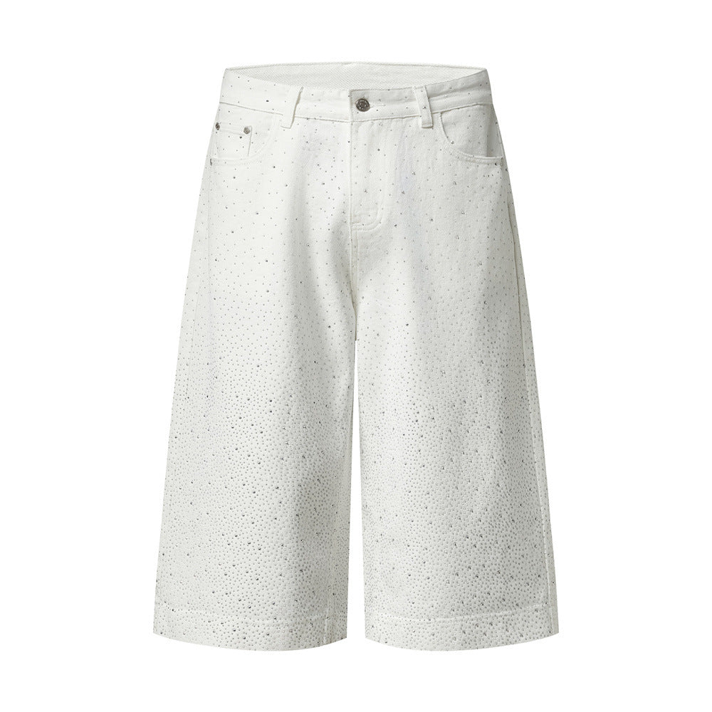 Men's wide-leg rhinestone-embellished denim shorts in white, shown front view with scattered crystal detail
