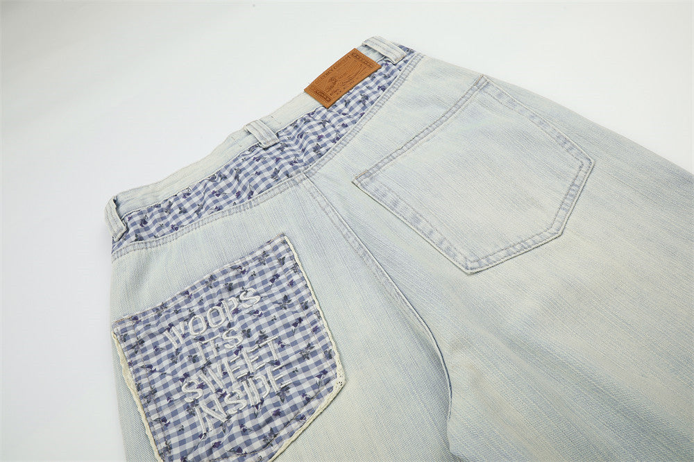 Jean homme à jambes larges, délavage clair, denim vintage déstructuré et empiècements vichy