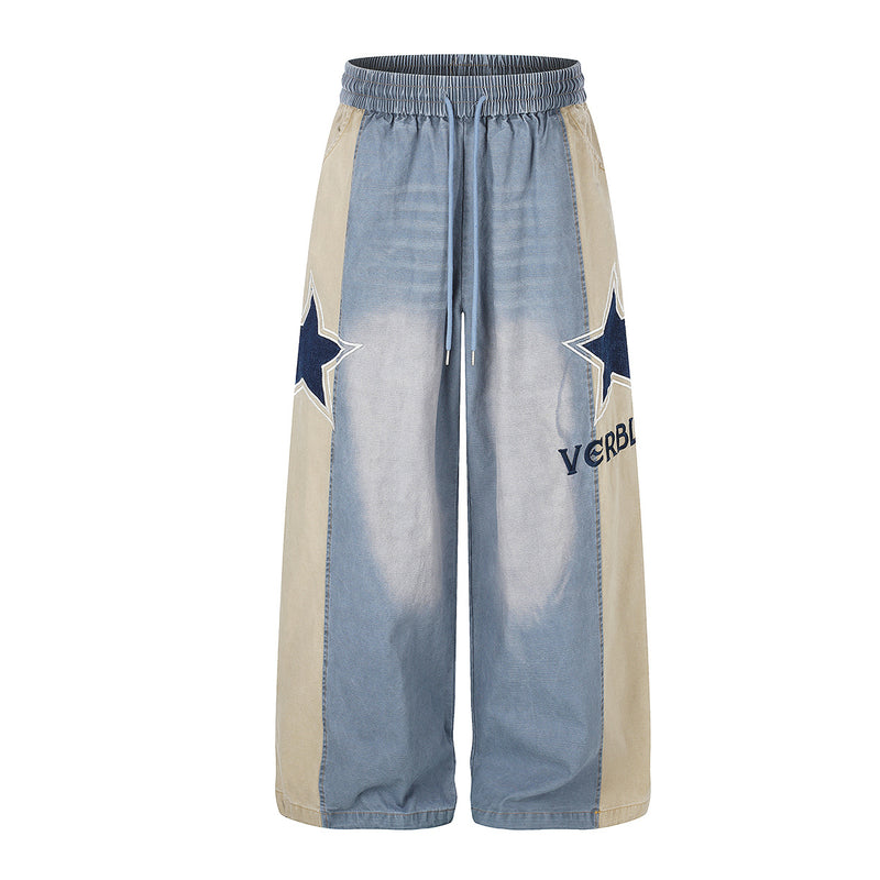 Jean délavé à jambes larges et empiècements color block, broderie de patch étoile et taille élastique à cordon, vues avant et arrière
