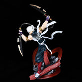 The Tengen Uzui Battle Sound Pillar Figure from Demon Slayer features the iconic white-haired, ponytailed Hashira in a black sleeveless outfit. It holds two blades and stands on a swirling red and gray base with flowing ribbons—a must-have 27cm GK high-quality PVC collectible.