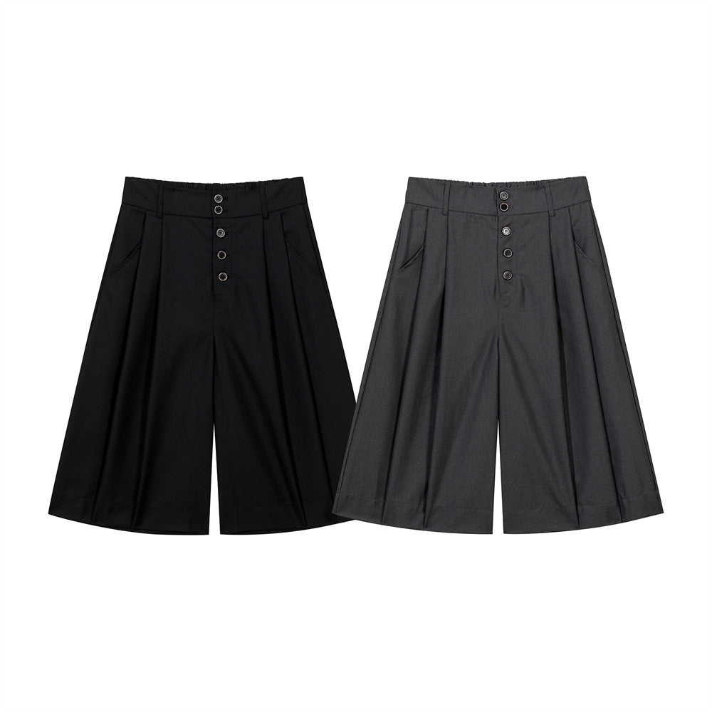 Wide-leg pleated culottes shorts in black and charcoal grey with button fly and high waist