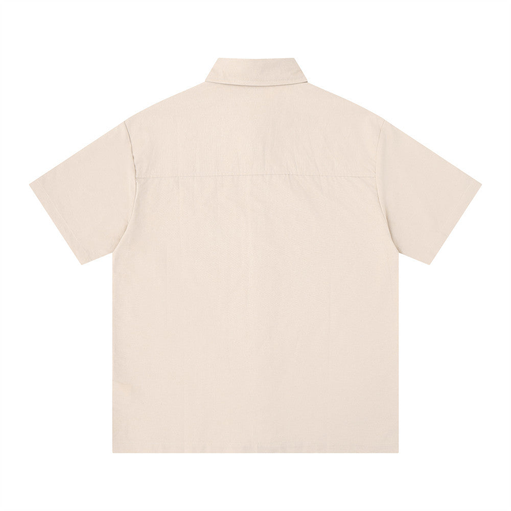 Beige short sleeve button-up shirt back view with plain solid color