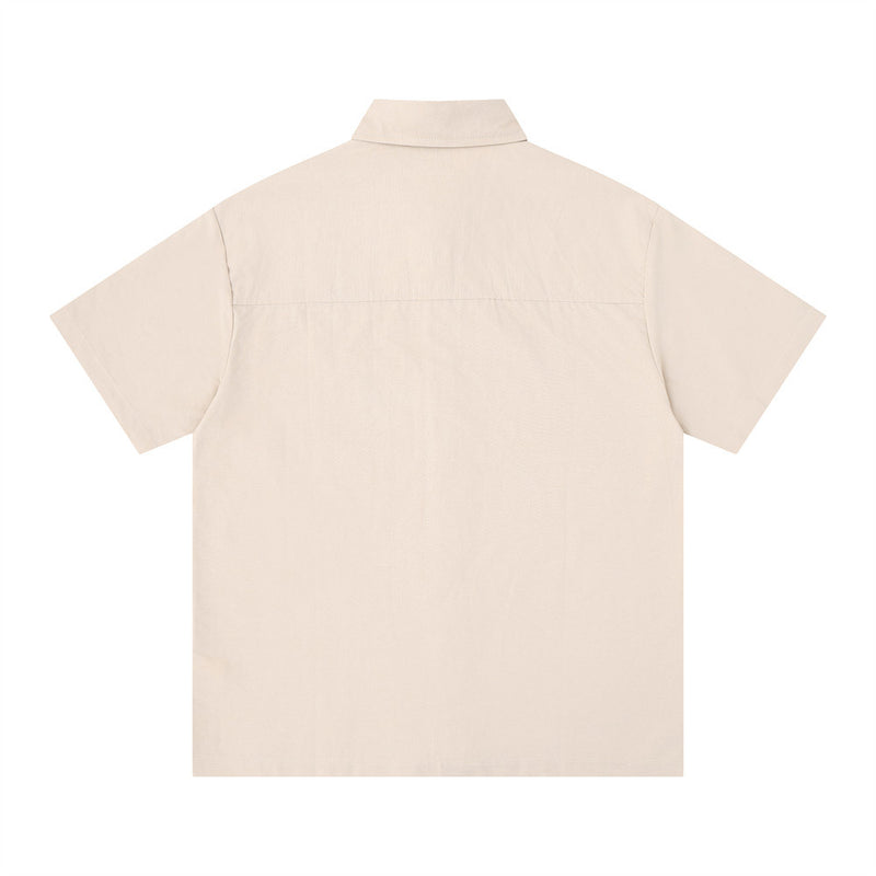 Beige short sleeve button-up shirt back view with plain solid color
