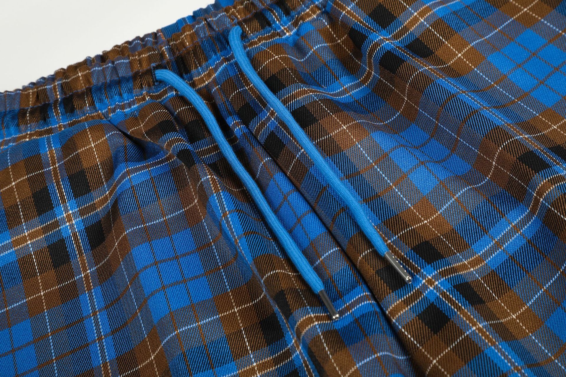 Wide-Leg Plaid Pants – Blue Tartan Baggy Fit with Crest Graphic & Drawstring Hem