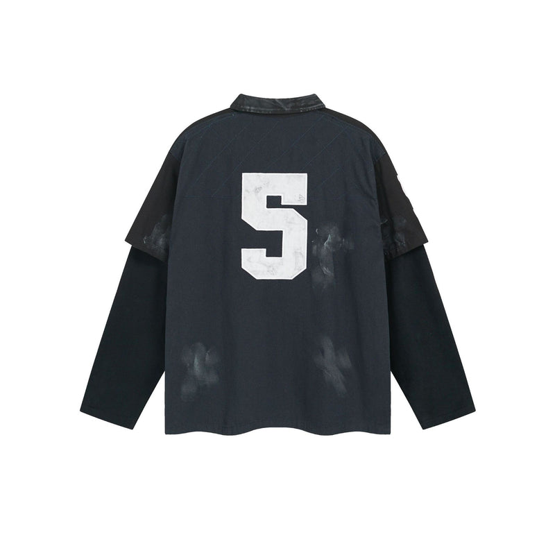 Polo de rugby oversize con lavado ácido – Mangas de falsa capa y bordado de gran tamaño