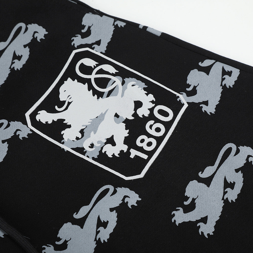 Pantalon de survêtement large imprimé lions, avec bande contrastante taille haute