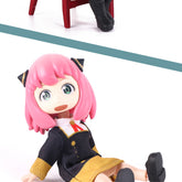 The Seakoff Anya & Yor Forger Nendoroid Set features poseable Spy x Family figures: Anya with pink hair in a black outfit on the floor, and Yor with black boots, partially visible seated on a red chair.