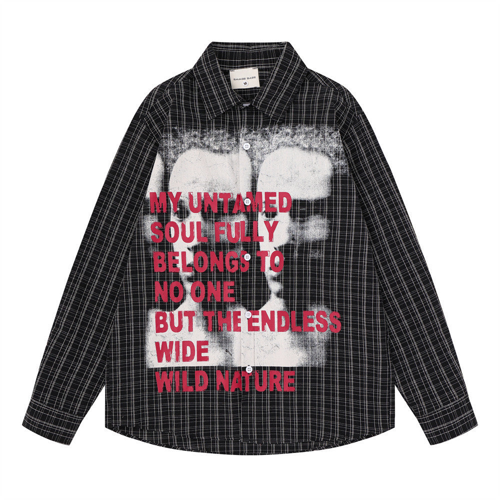 Oversized men's plaid flannel long sleeve shirt with abstract face graphic and red slogan print, shown in black and red color
