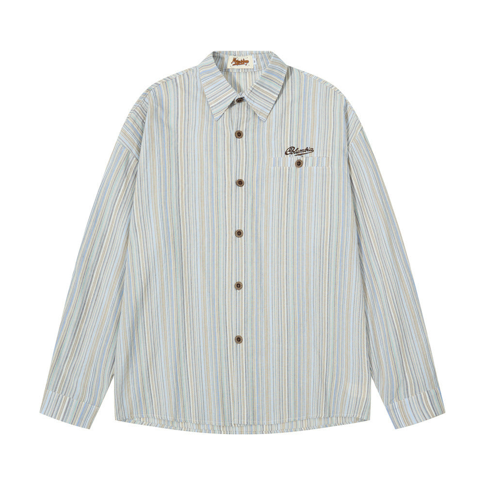 Front view of a light blue striped button-up shirt with chest embroidery and long sleeves