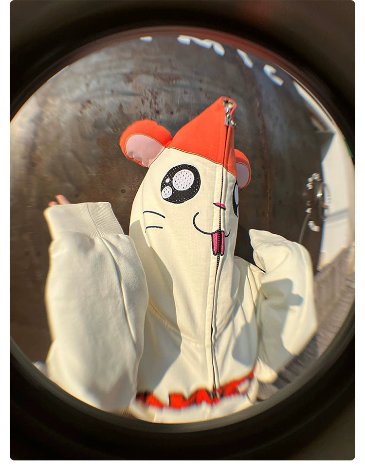 A person wears the Seakoff Cute Hamster Cartoon Hoodie, zipped over their face. The hood features playful ears and eyes, embodying a hamster&