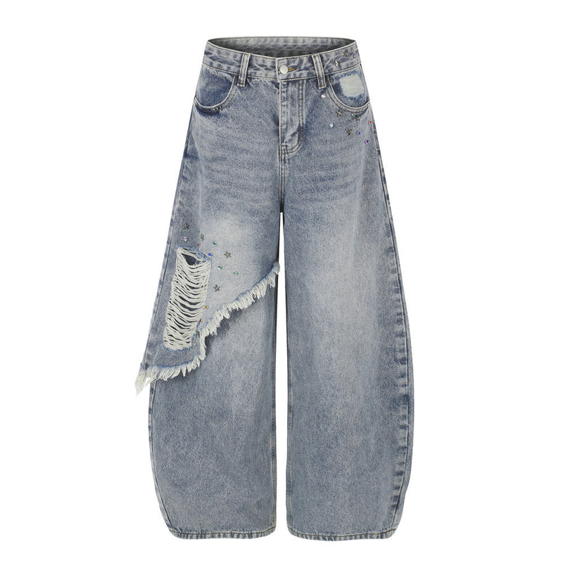 Jean large déchiré pour homme avec ornements en strass et étoiles