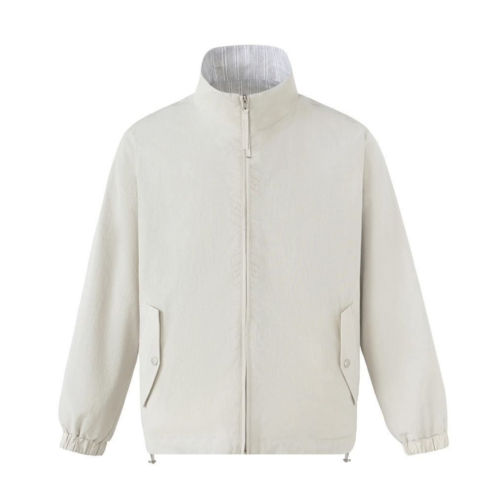Reversible stand collar zip jacket shown in cream solid and grey pinstripe, oversized fit with snap hip pockets and elasticat