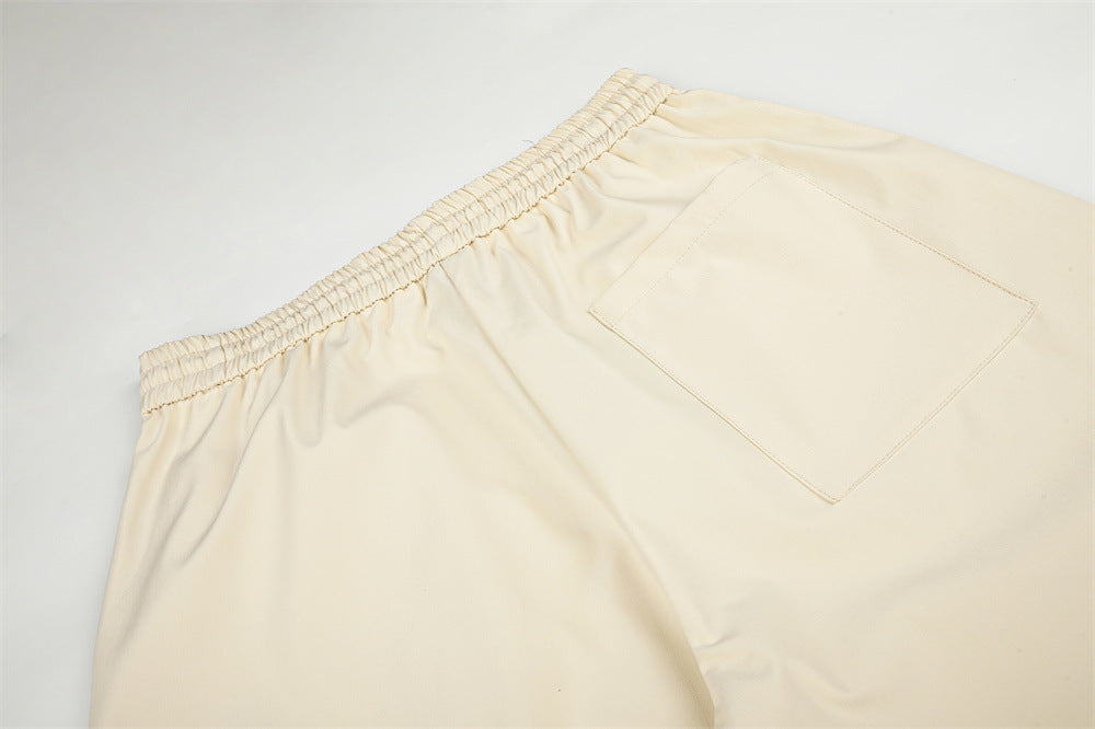 カラーブロックトラックスーツセット｜スタンドカラージップジャケット＆レタリング入りワイドレッグパンツ