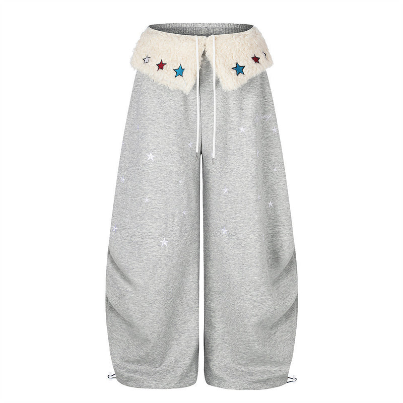 Sweatpants mit weitem Bein, Sternstickerei und umgeschlagenem Sherpa-Bund