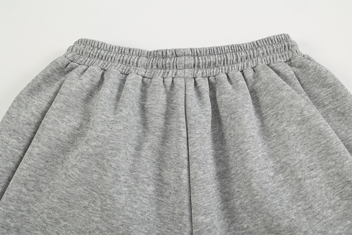 Pantalon de survêtement à jambes larges, rayures diagonales et lettrage – Coupe droite street
