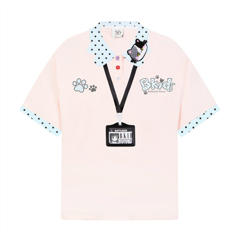 BKids Battlekid Storm oversized polo shirt in pink with polka-dot collar, cat embroidery patch, paw print graphics, and decor