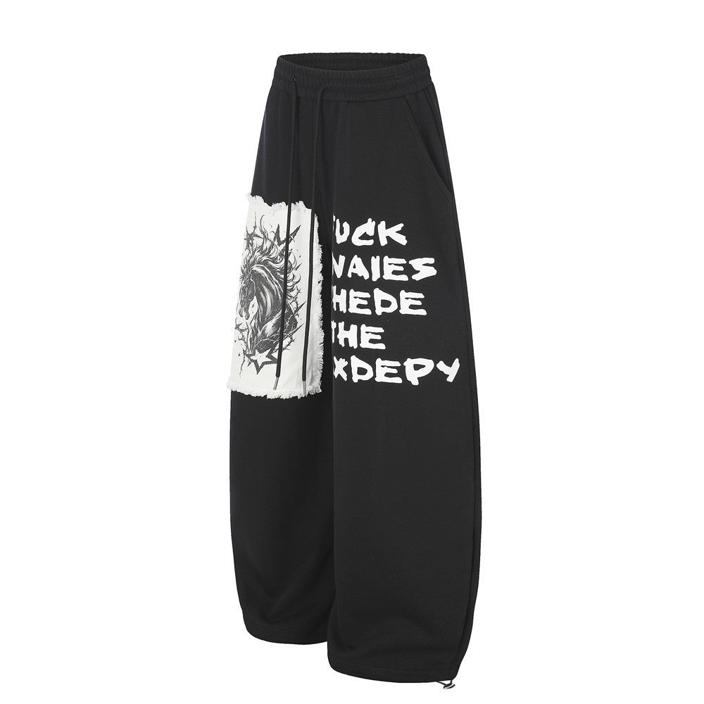 Pantalon de survêtement homme à jambes larges, motif graphique – Écusson licorne et slogan imprimé noir