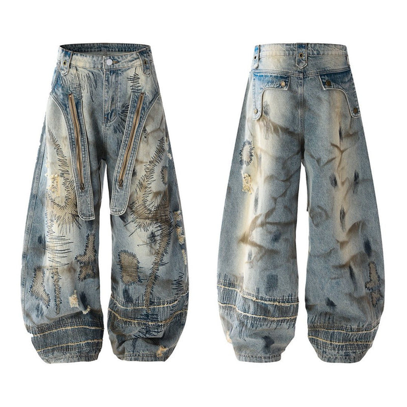 Baggy Wide-Leg Jeans – Chaotic Embroidery, Distressed Denim & Arc-Hem Design